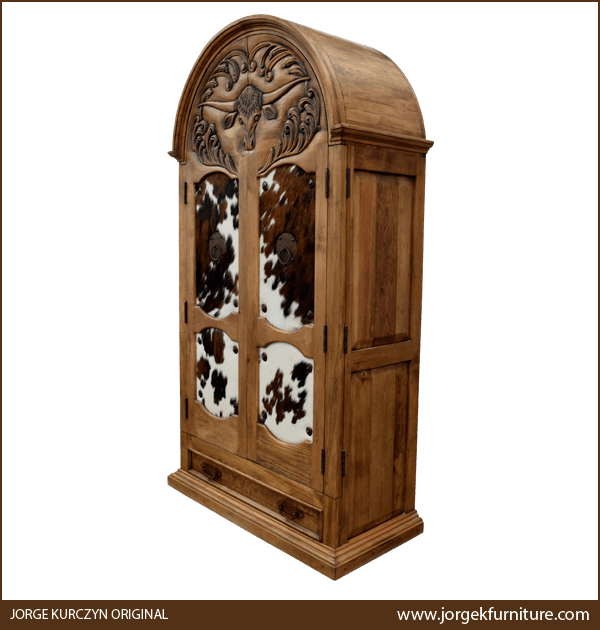 Three-quarter angle of Lucero 3 armoire showing carved details and molding base