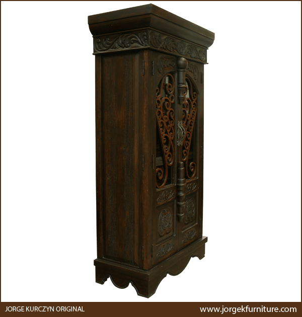 Three-quarter angle of Martina 2 armoire showing curved apron and antique dark finish