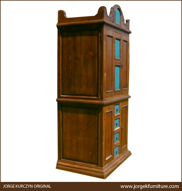 Three-quarter angle of Rosales Turquesa armoire showing staggered molding base and side panel details