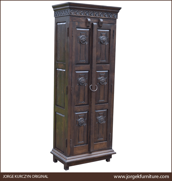 Three-quarter angle of Santa Fe 2 armoire showing carved panels and square feet