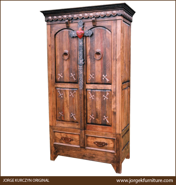 Front view of Santa Cruz armoire with iron cross, carved heart, and copper conchos