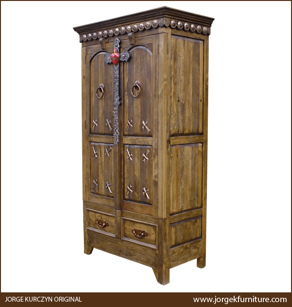 Three-quarter angle of Santa Cruz armoire showing carved panels and natural wood finish