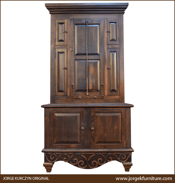 Front view of Chuck Wagon 3 Spanish colonial armoire with closed panels and antique finish