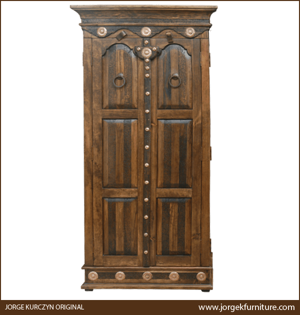 Front view of El Matador armoire with copper conchos and carved colonial curved design