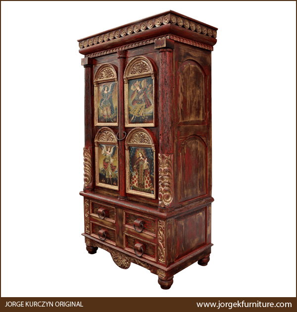 Three-quarter angle of Zoila-Elisa armoire showing carved scrolls and iron ring detail