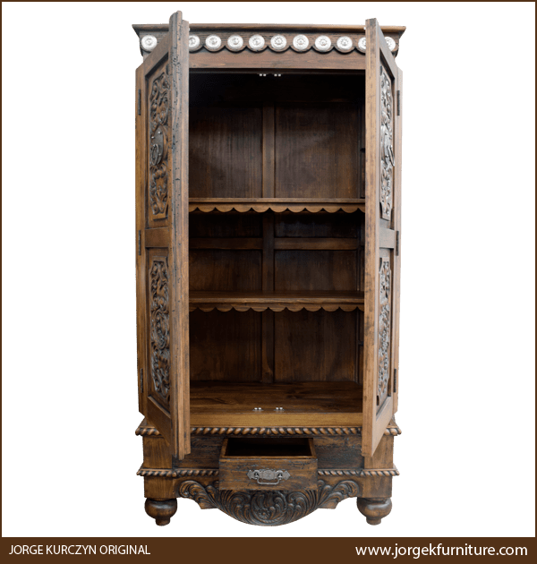 CONSEQUENCES armoire with doors and drawer open showing three storage compartments and ornate shelving