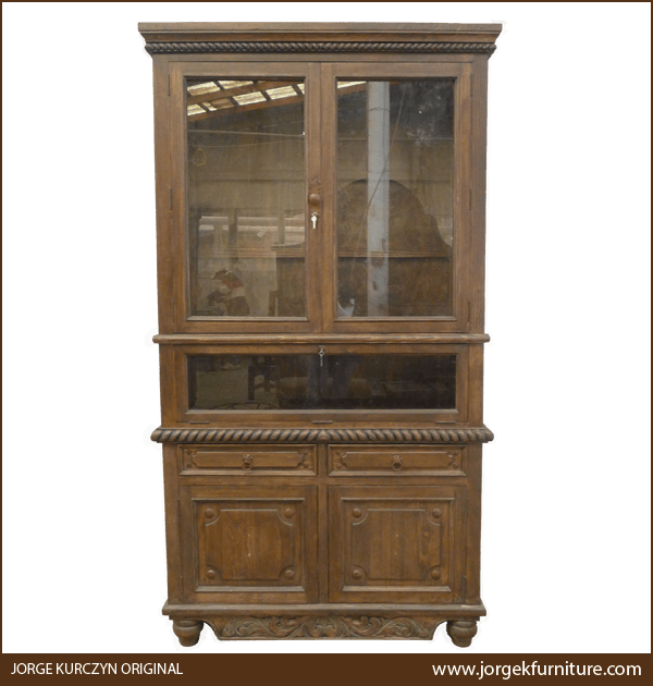 Front view of ALACENA armoire with vertical and horizontal glass doors, iron handles and conchos