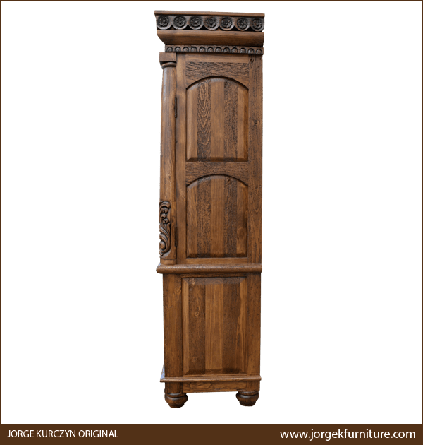 Side view of Irma armoire with rectangular cut panels and antique finish