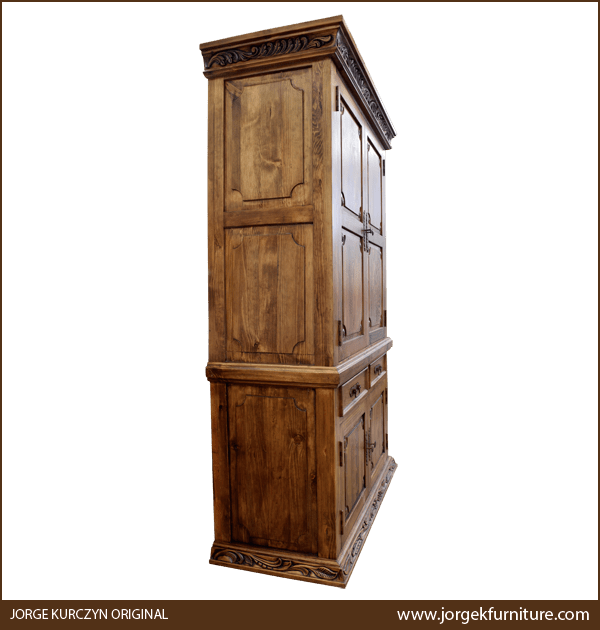 Spanish Colonial Armoire from opposite semi-frontal angle showing side panels and carved details