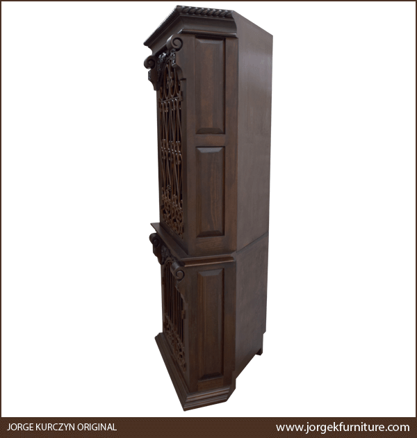 Side view of Spanish Colonial Armoire with geometric panels and solid wood base