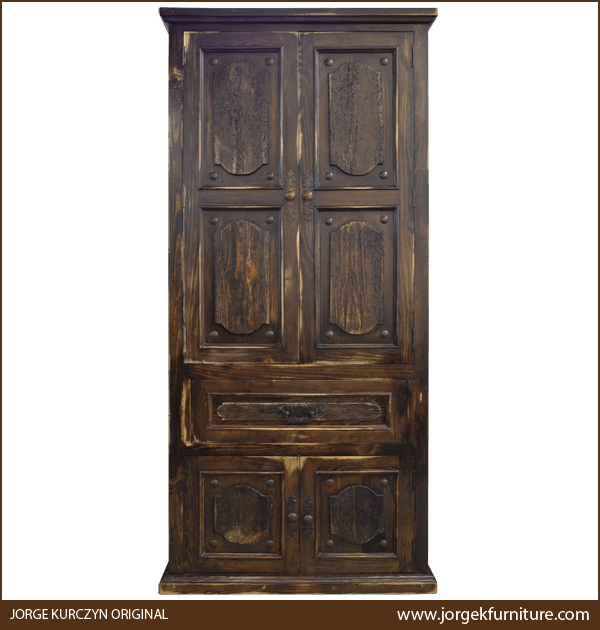 Front view of Spanish Colonial Armoire with distressed finish and iron conchos