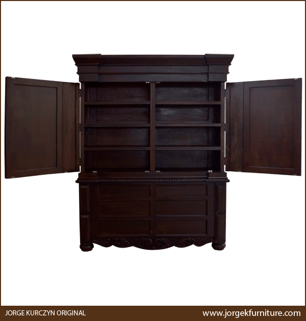 Front view of armoire with doors open showing two spiral columns and four storage compartments