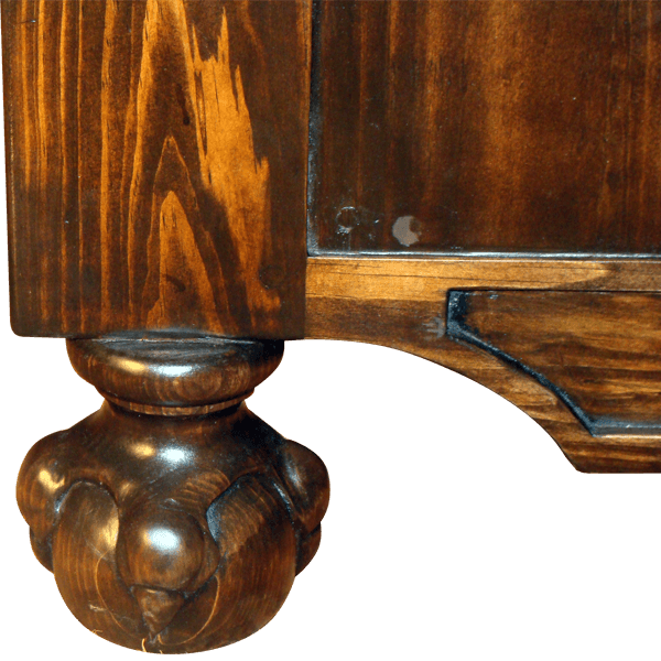 Detail of ball and claw foot carved in solid wood on Western-style bed