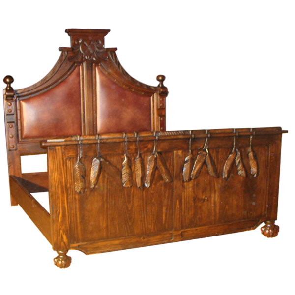 Semi-front view of Western-style bed with tribal carvings and natural leather panels