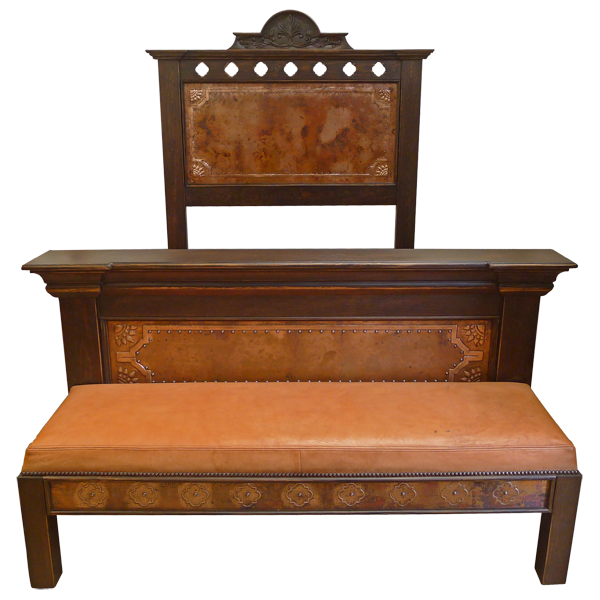 Front view of Spanish colonial bed with hammered copper panels, carved crest, and leather bench