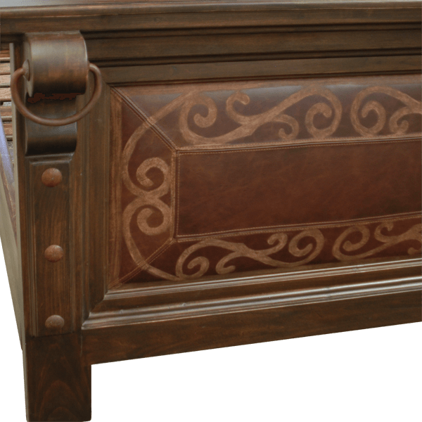 Detail of footboard with forged iron nails and spiral tooled leather on Western-style bed