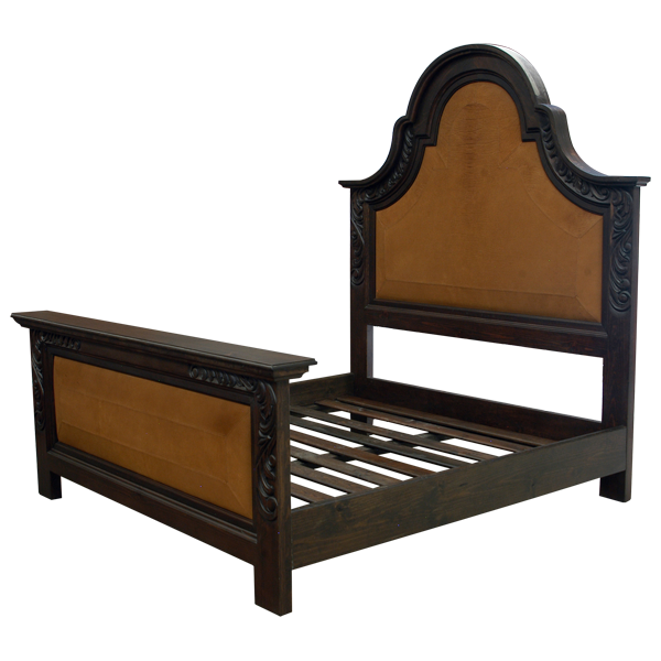 Semi-front view of Western-style bed with patterned yellow leather and scroll wood details