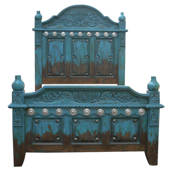 Front view of Spanish colonial bed with silver copper conchos and twist rope carving