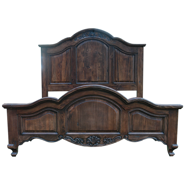Front view of Spanish colonial bed with arched headboard, geometric panels, and floral carving