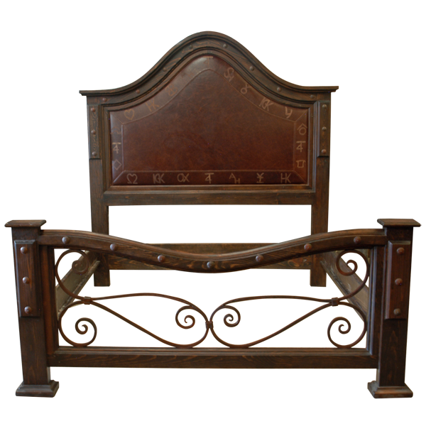 Front view of Western-style bed with ranch brand leather and forged iron scrollwork
