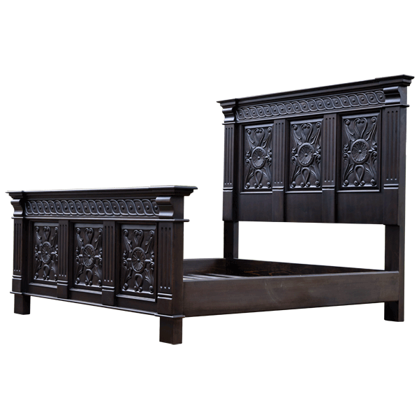 Semi-front view of Spanish colonial bed with hand carved details and dark wood structure