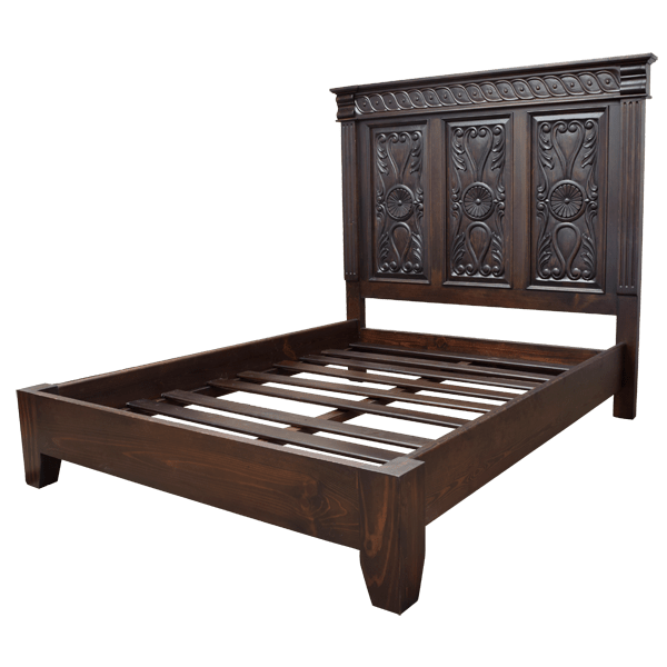 Semi-front view of Spanish colonial bed with hand carved geometric and floral details