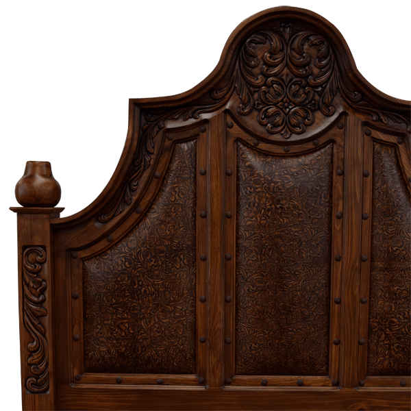 Detail of headboard with floral scroll carving and embossed leather panels