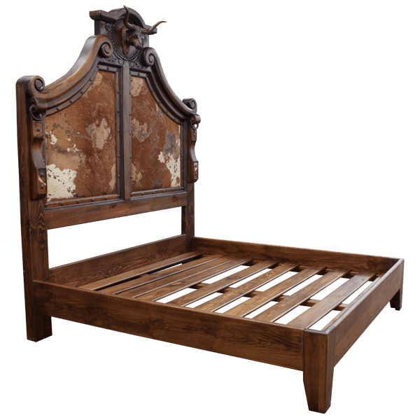 Cowboy 5 handcrafted Western bed semifrontal view showing curved headboard with hand-carved scrolls, cowhide upholstery, bull head crest, and sturdy wood platform