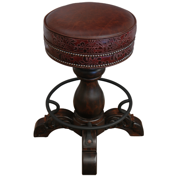 Top view of El Matador Bajo 3 bar stool showing tooled leather seat, decorative tacks, carved legs, and forged iron footrest