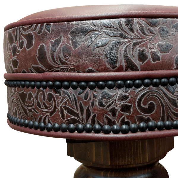 Side close-up of El Matador Bajo 7 bar stool seat with embossed wine leather and cowhide trim