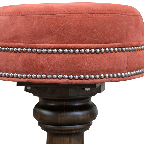 Close-up of El Matador Bajo 9 seat showing red fabric and cowhide trim