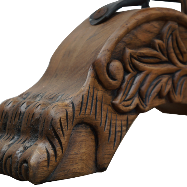 Close-up of La Rocca Colonial 9 bar stool leg with lion’s feet carving and circular iron footrest