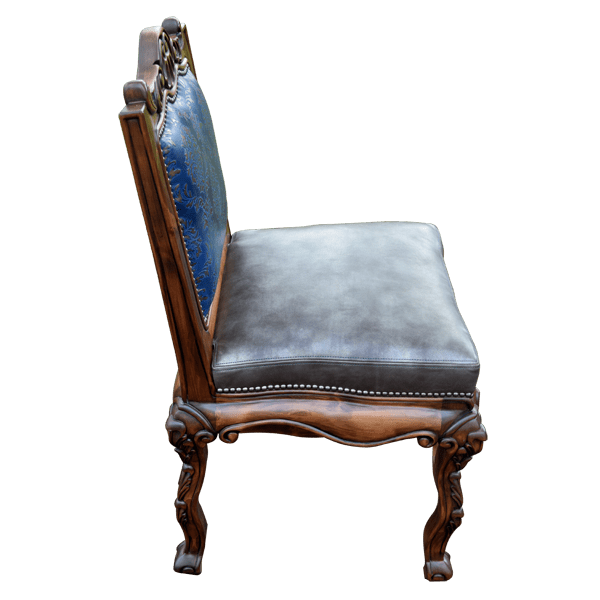Side view of The Picador 7 bar stool with blue leather backrest and carved armrest
