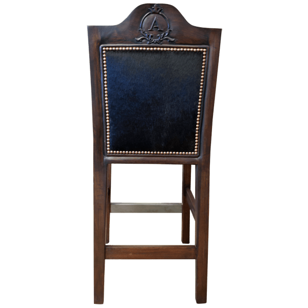 Rear view of bar stool with carved seatback and leather scrollwork