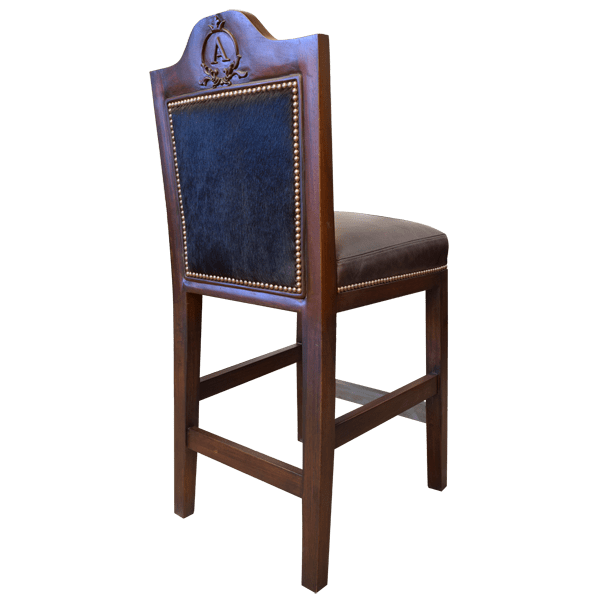 Three-quarter rear view of bar stool with scroll initials and leather upholstery