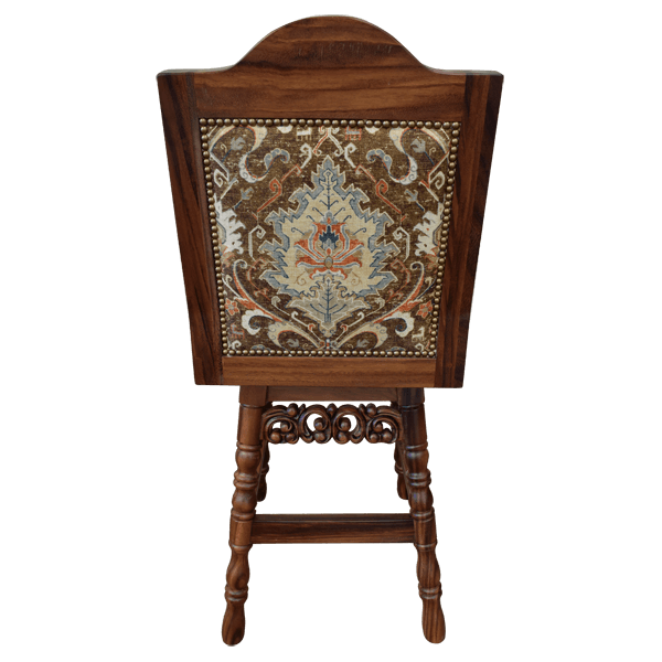Rear view of barstool with bamask upholstery and brass tacks
