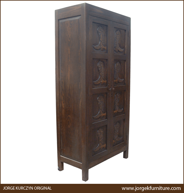 Western armoire with dark antique finish and distressed details, semi frontal view